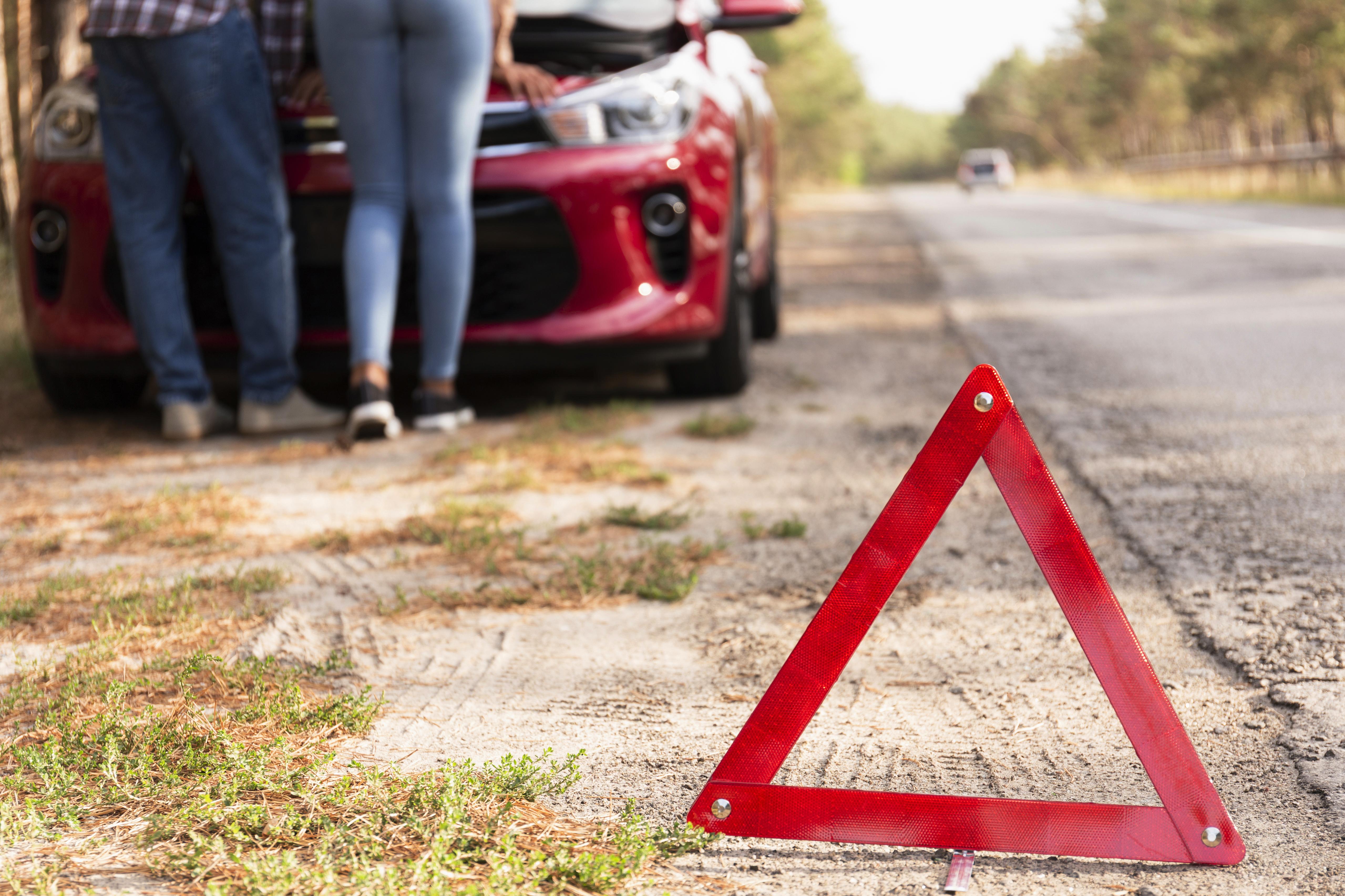 red-triangle-sign-road-car-problems-while-traveling